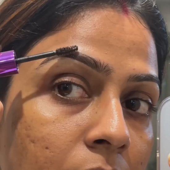Real customer applying BrowStay peel-off brow tint