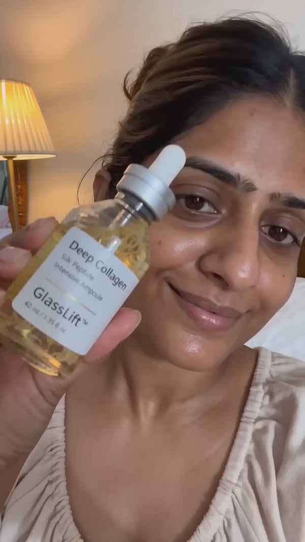 Indian woman shows ampoule and applies drops along jaw at her dresser, real UGC